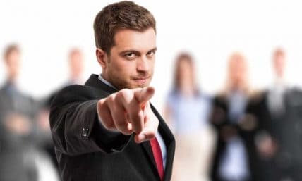 How to be confident - Suited Man Pointing Finger