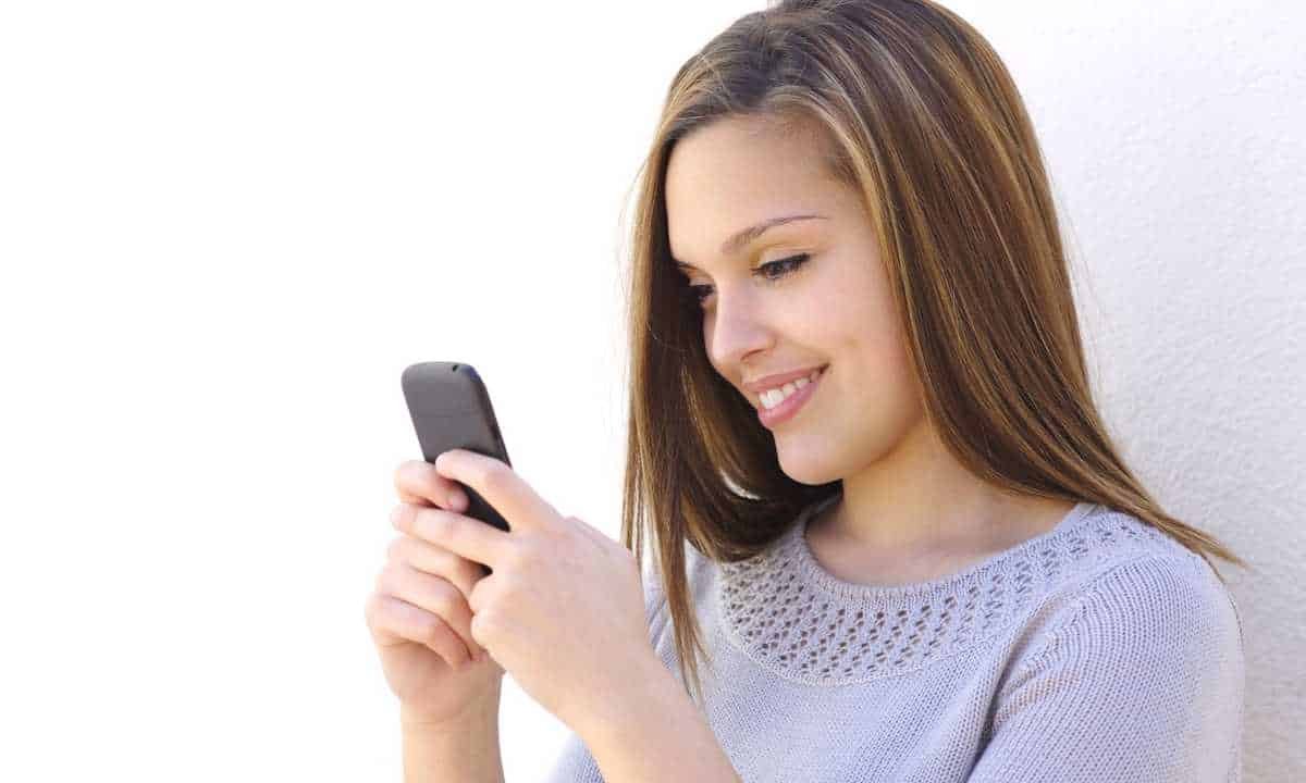 Woman texting a guy she likes.